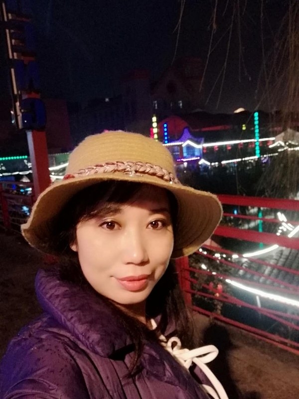 阳光明媚的第一张照片--黑龙江闪婚服务中心